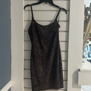 Sparkly short plum homecoming dress.
